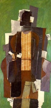 350 人の有名アーティストによるアート作品 Painting - パイプを持つ男 喫煙者 1914年 パブロ・ピカソ
